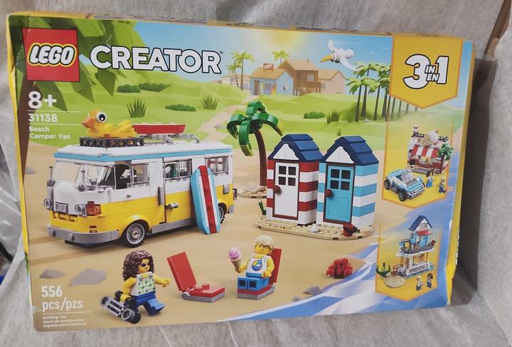 The LEGO 31138 Beach Camper Van features surfboards, a furnished camper with a kitchen and sleeping area, minifigures, and even a palm tree for realistic beach storytelling. Kids can invent endless holiday adventures, from road trips to surfing sessions or serving sweet frozen treats. The colorful camper van and beach accessories make it a cheerful display piece when not in use.