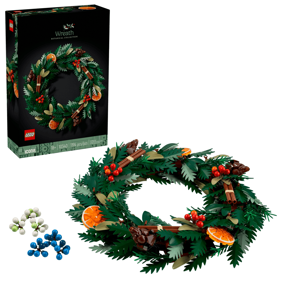 LEGO Icons 10340 Wreath Botanical Collection box with the finished 1,194-piece wreath and the red, blue and white berry options